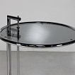 Verschiedene Tischplatten (Klarglas, Rauchglas, Metallplatte).
